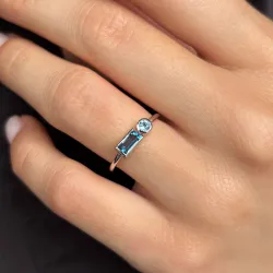 Anillo de topacio azul tratado en oro blanco 18K – Celinni