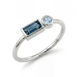 Anillo de topacio azul tratado en oro blanco 18K – Celinni