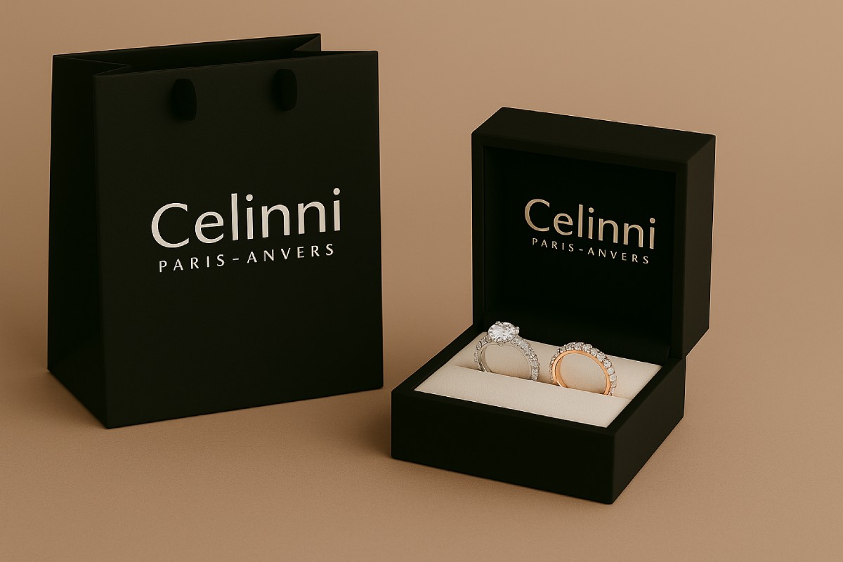 Zwei mit Diamanten besetzte Trauringe aus Platin, präsentiert in einer schwarzen Schatulle mit dem Logo „Celinni Paris-Antwerpen“, Symbol für Luxus und ewige Verbundenheit.