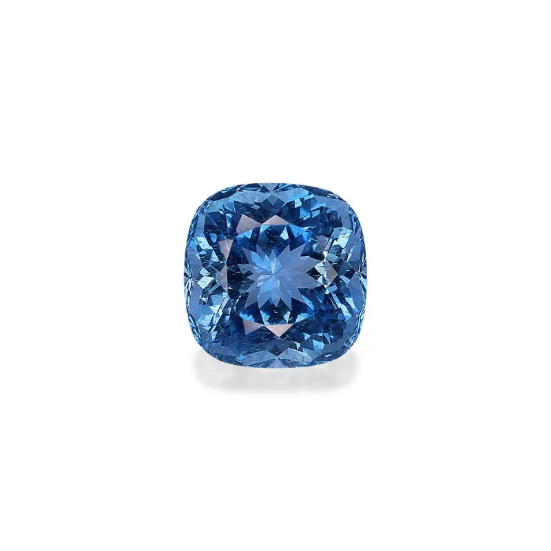 Un diamant bleu naturel taillé en coussin, reflétant des nuances de bleu profond et une clarté exceptionnelle.