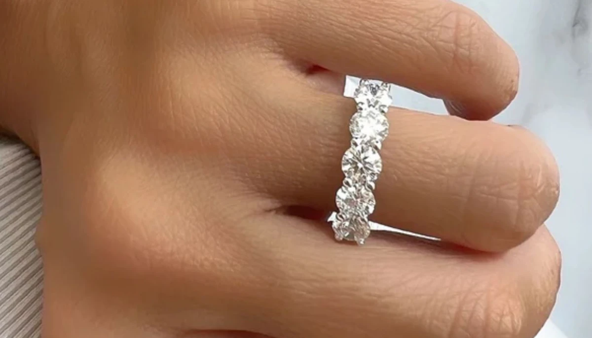 A ring with brilliant natural diamonds on an elegant hand
