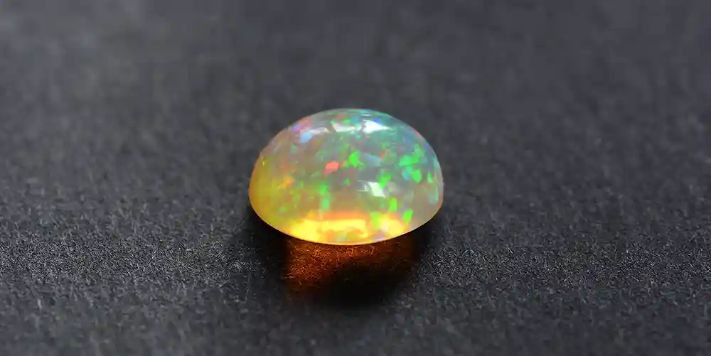 Dive into the vibrant splendor of Ethiopian opal with Celinni Ethiopian opal jewel from the Celinni, highlighting a spectacular play of colors and unique patterns.