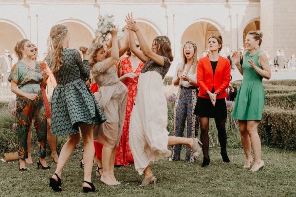 Guests celebrating the wedding together, illustrating the importance of thanking guests for their presence and support