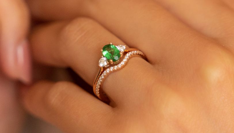 Art Deco engagement ring with emerald and diamonds